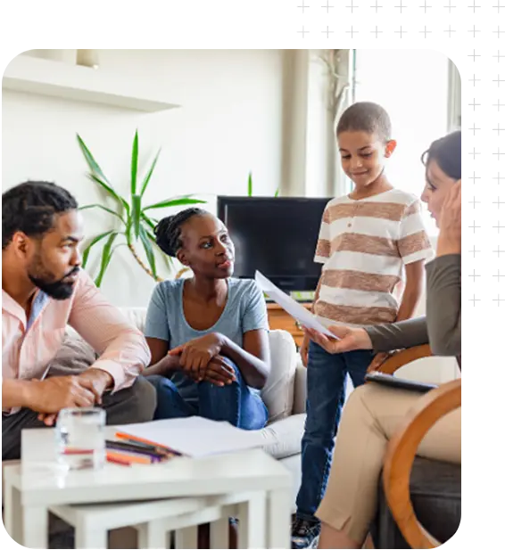 Mental-Whole-Family An African-American husband, wife and son meeting with a counselor