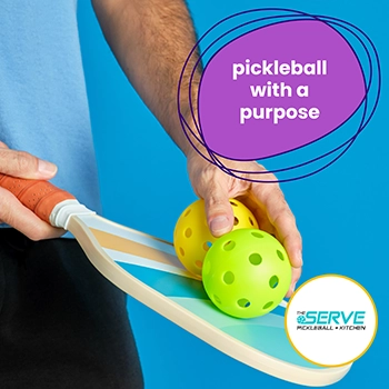 A person holds two yellow pickleballs and a paddle against a blue background. Text reads “pickleball with a purpose.” Serve Pickleball + Kitchen logo is visible.